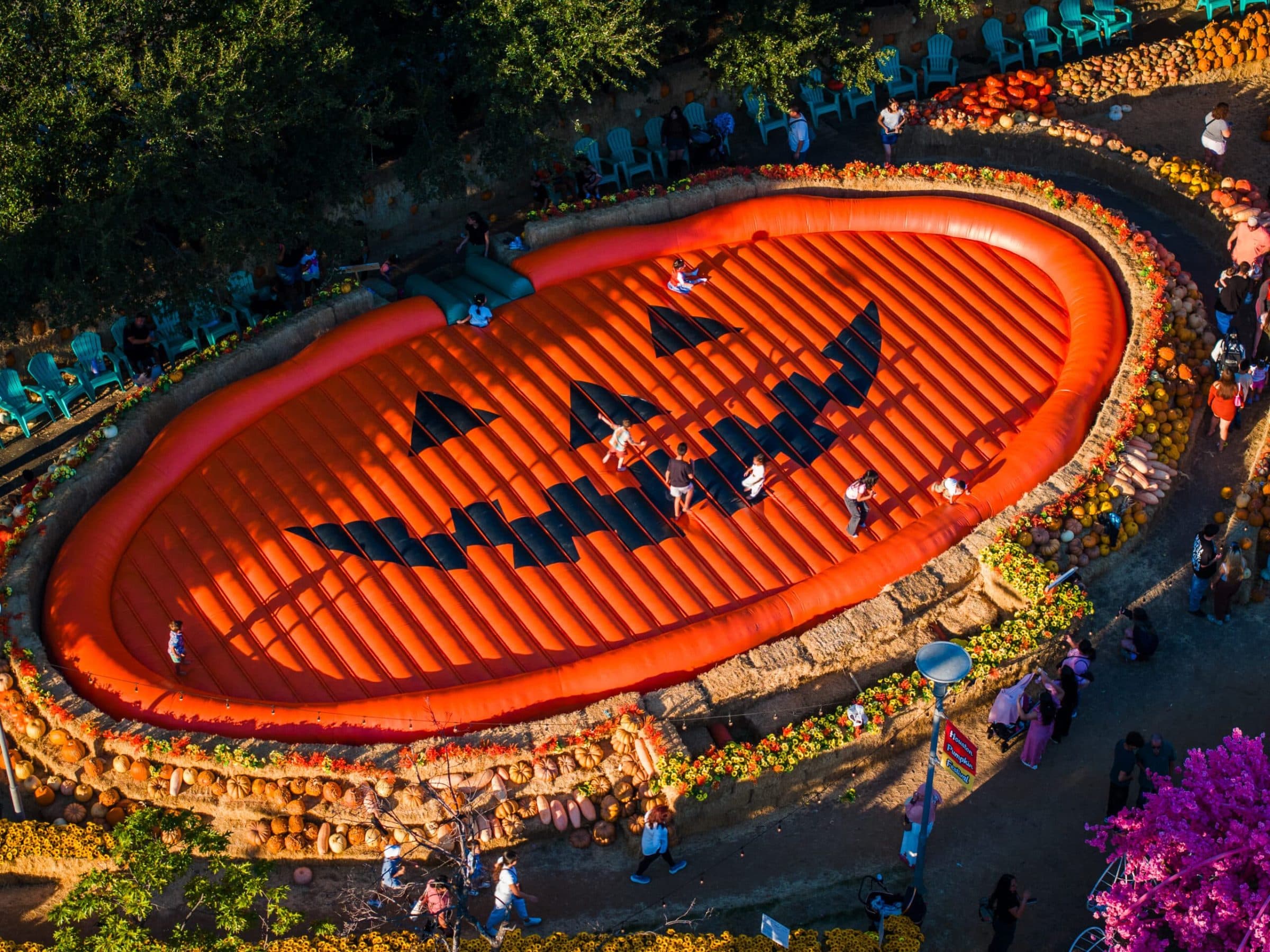 The giant inflatable jack-o'-lantern bounce pillow at sunset